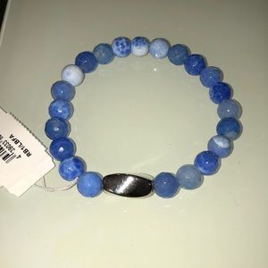 Blue bead bracelet.